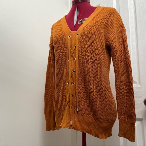 Guess women mustard yellow long sleeves lace front knitted sweater.Size XS. Used - Picture 7 of 7